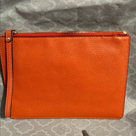 Michael Kors Orange Clutch with Intricate Embossed Design - Picture 5 of 11